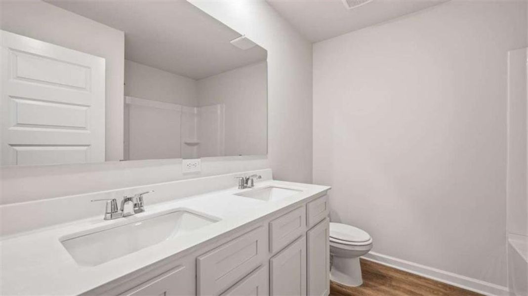 Furnished interior view inside a new home in Shoal Creek, Hampton (Image 6).