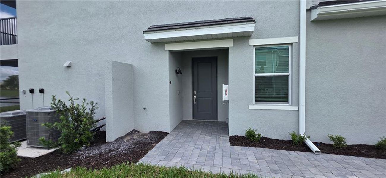Exterior details and patio area of a home in Calusa Country Club, Lakewood Ranch (Image 4).