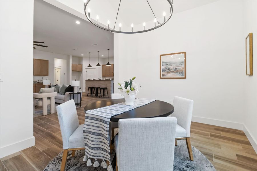 Dedicated dining area with cathedral ceiling Dedicated dining area with cathedral ceiling