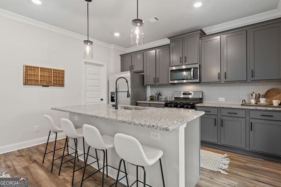 Furnished interior view inside a new home in Ponderosa Farms Manor, Gainesville (Image 13).