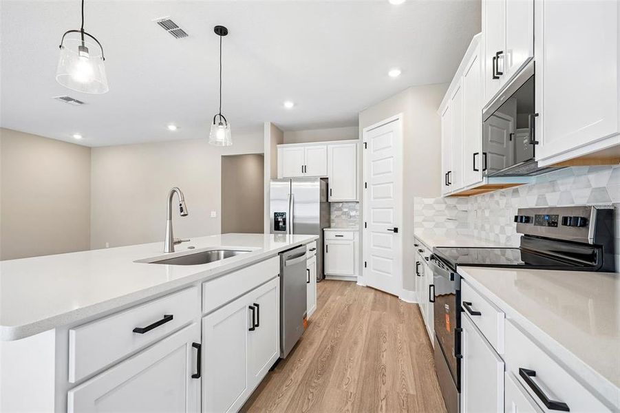 Furnished interior view inside a new home in Legends Preserve - Signature Series, Daytona Beach (Image 9).