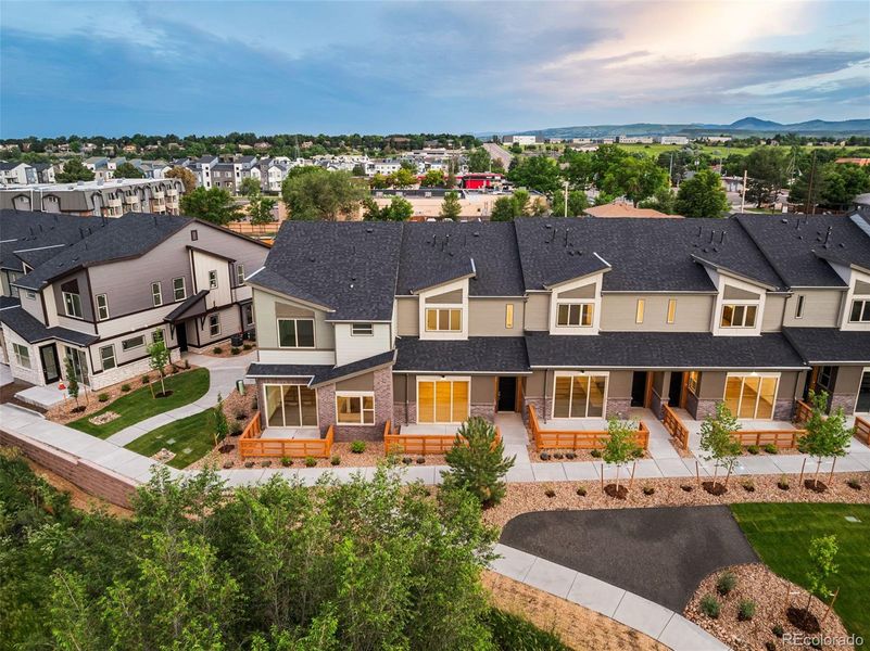 Front exterior of a new home in , Arvada, CO, highlighting curb appeal (Image 24).