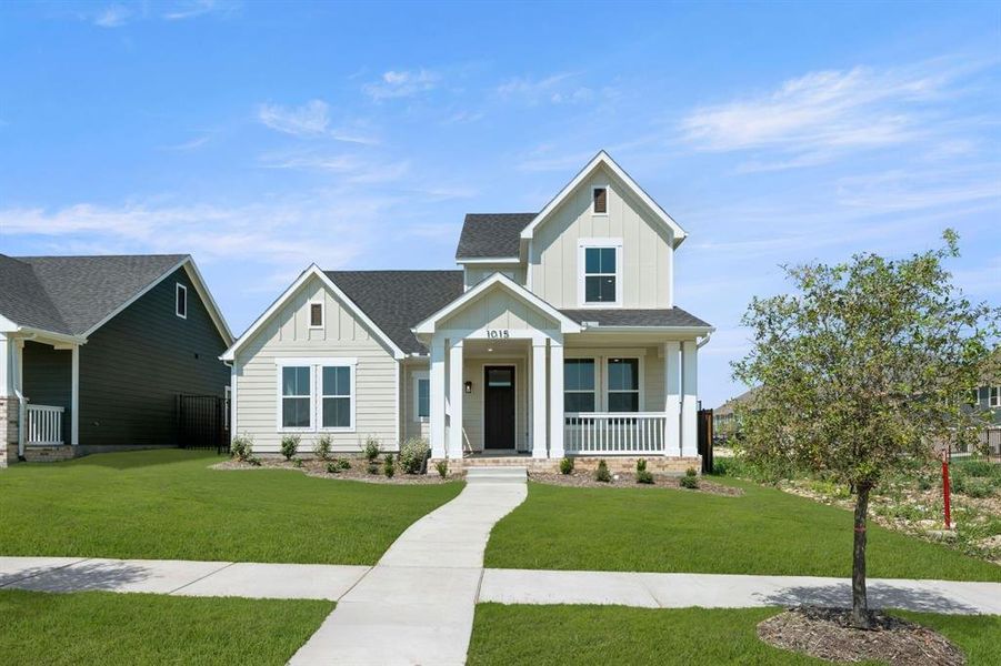 Front exterior of a new home in MidTowne, Midlothian, TX, highlighting curb appeal (Image 2).