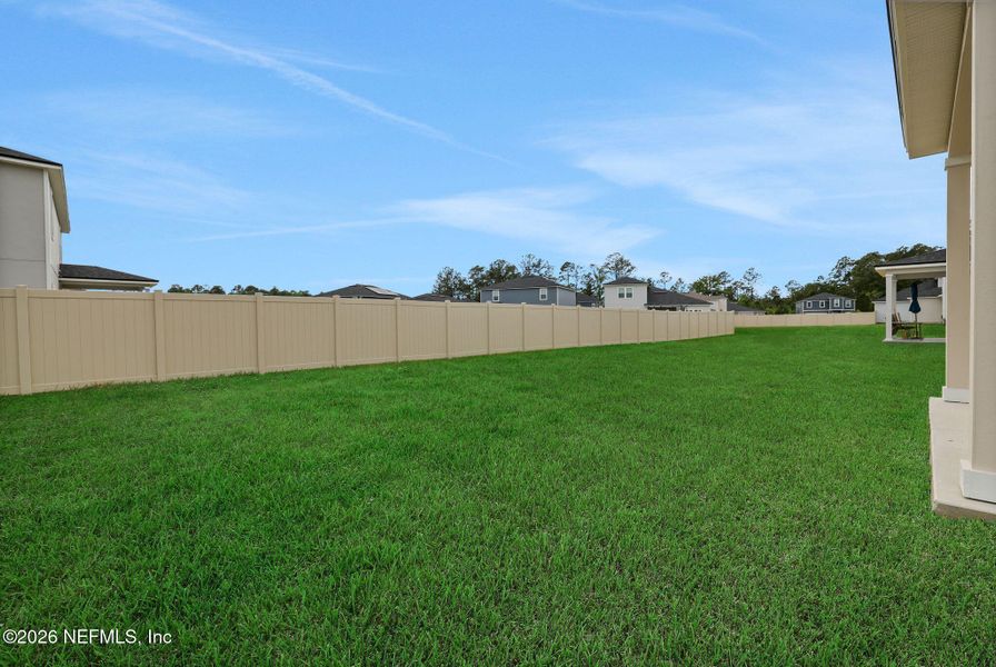 Exterior details and patio area of a home in Wilford Oaks, Orange Park (Image 28).