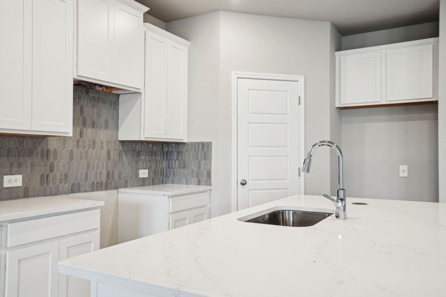 Photo is not of the actual home, but is an inspirational photo of builder’s model home and may depict options, furnishings, and/or decorator features that are not included