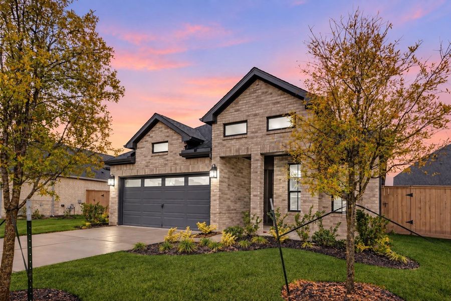Front exterior of a new home in Katy Court, Katy, TX, highlighting curb appeal (Image 2).