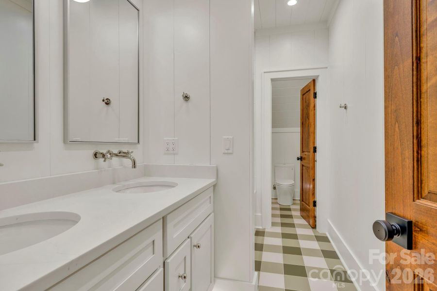 Full Bath in Bedroom Suite, easily accessible to 2nd living