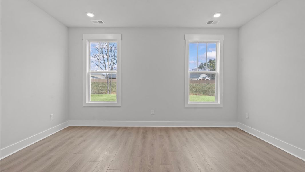 First-rate hardwood flooring and thoughtful upgrades in this select townhome by DRB Homes