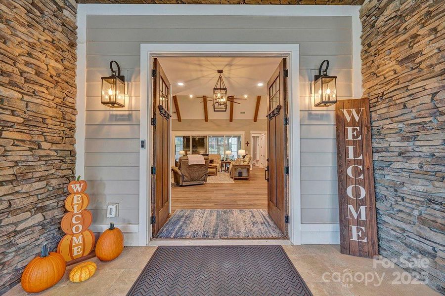 Opening to an open, split floor design on the main level with excellent sight lines extending to the pool courtyard.