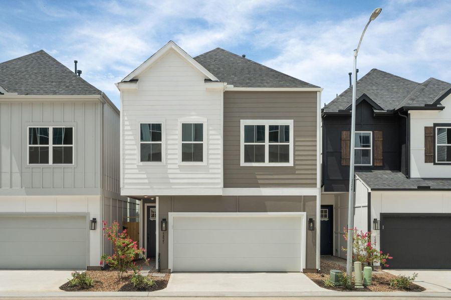Front exterior of a new home in , Houston, TX, highlighting curb appeal (Image 26).