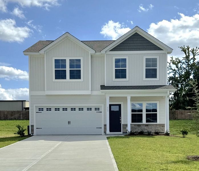 Front exterior of a new home in Jordan Grove, Conway, SC, highlighting curb appeal (Image 1). Front exterior of a new home in Jordan Grove, Conway, SC, highlighting curb appeal (Image 1).
