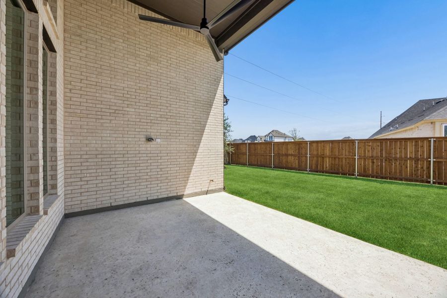 Exterior details and patio area of a home in The Parks at Wilson Creek, Celina (Image 26).