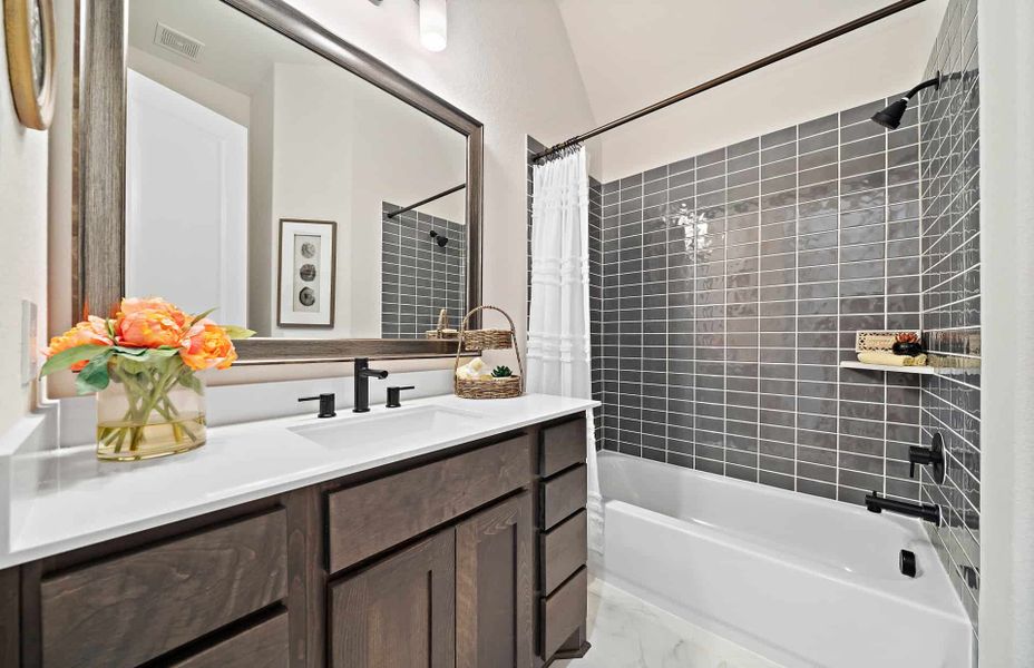 Representative furnished interior of a home built from the 3546 by Ravenna Homes in Artavia 70′, Conroe (Image 23).