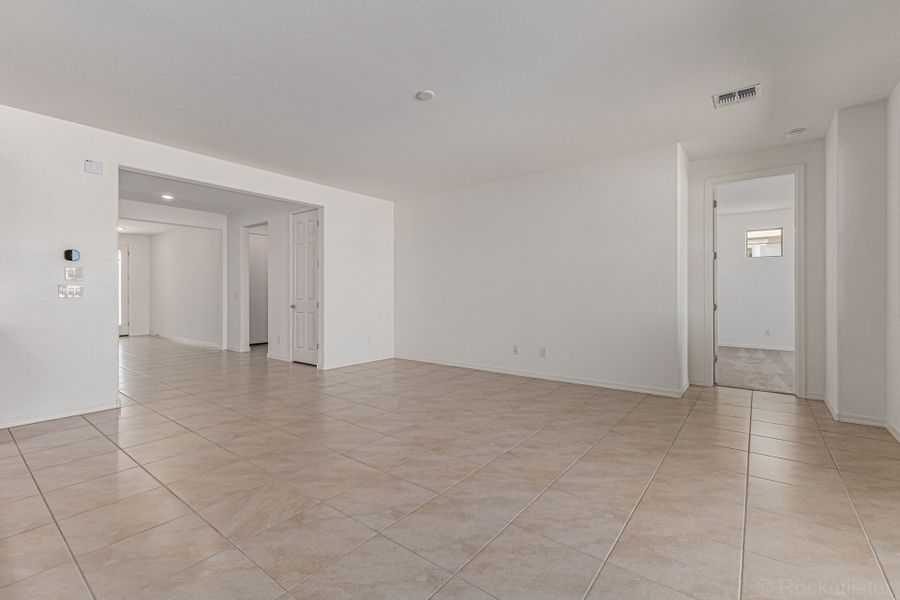 Spacious, unfurnished interior of a new home in Empire Pointe, Queen Creek (Image 8).