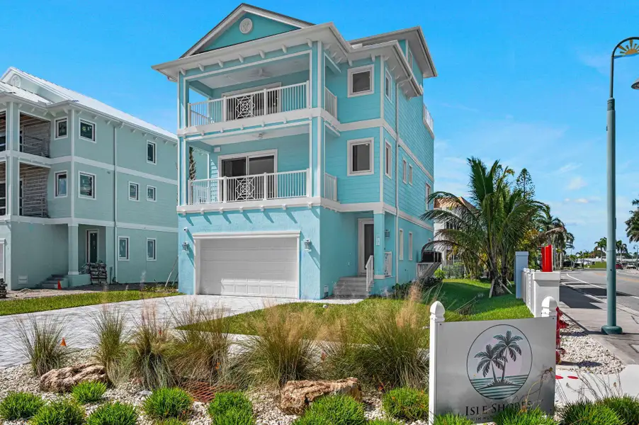 Front exterior of a new home in , Fort Pierce, FL, highlighting curb appeal (Image 1). Front exterior of a new home in , Fort Pierce, FL, highlighting curb appeal (Image 1).