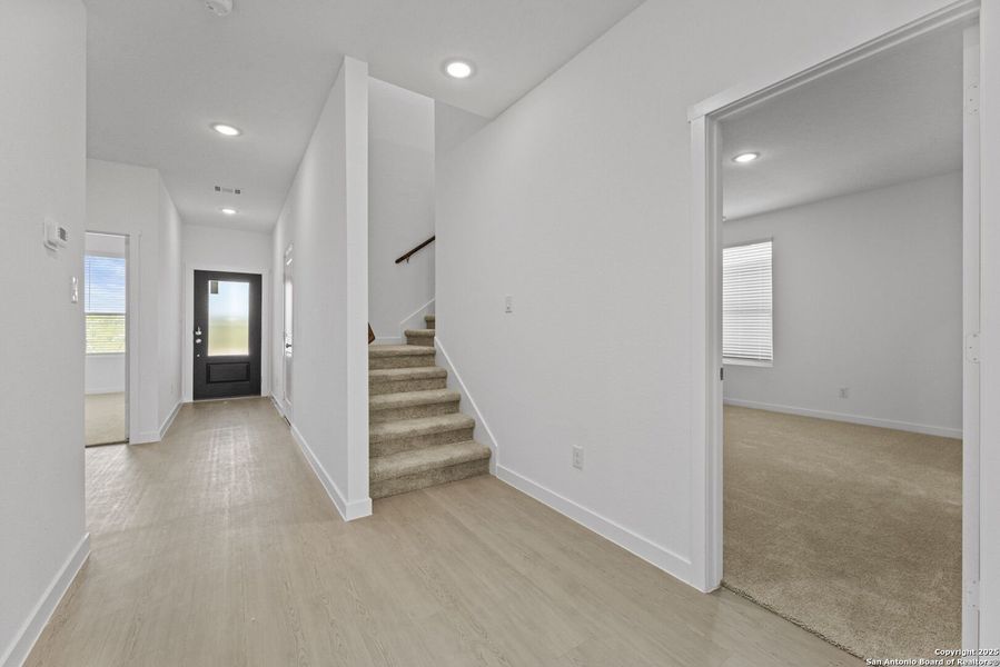 Spacious, unfurnished interior of a new home in Waterwheel: Coastline Collection, San Antonio (Image 14).