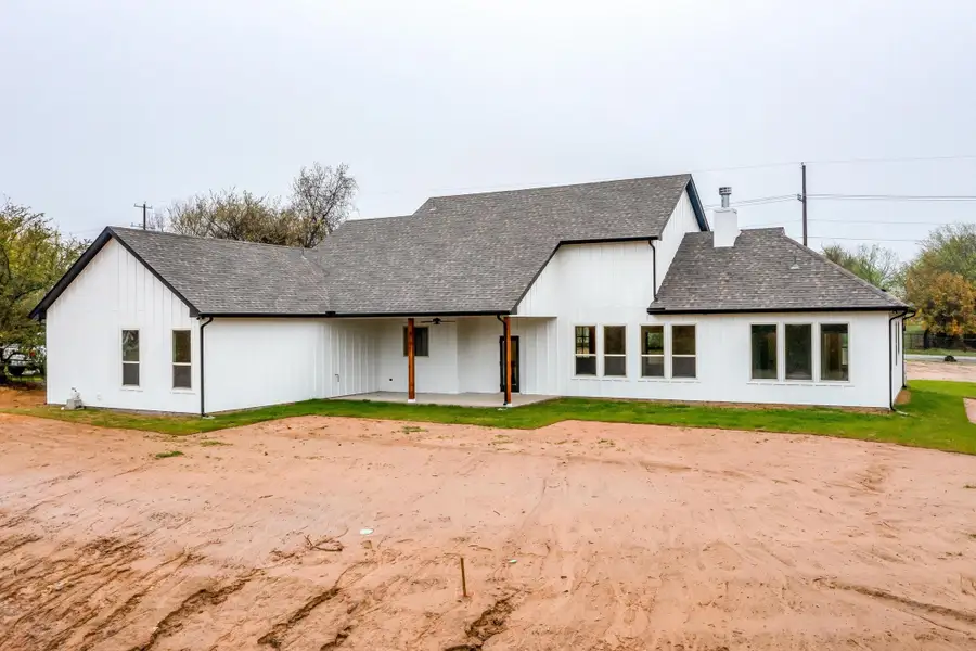 Representative exterior photo of a completed home built from the Pecan Grove by Trinity Classic Homes in The Reserve at Shadle, Poolville, TX (Image 26). Representative exterior photo of a completed home built from the Pecan Grove by Trinity Classic Homes in The Reserve at Shadle, Poolville, TX (Image 26).