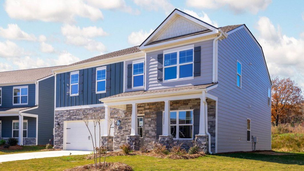 Front exterior of a new home in Prairie Pass, Apison, TN, highlighting curb appeal (Image 2).