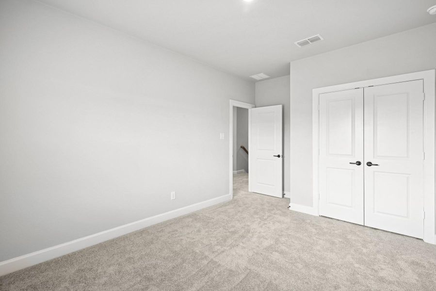 Spacious, unfurnished interior of a new home in Harvest Green 45', Richmond (Image 22).