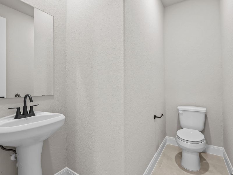 Furnished interior view inside a new home in Potranco Oaks, Castroville (Image 30).