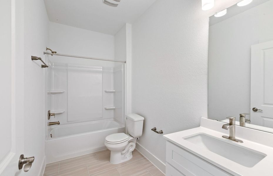 Furnished interior view inside a new home in Crosswinds, Kyle (Image 6).