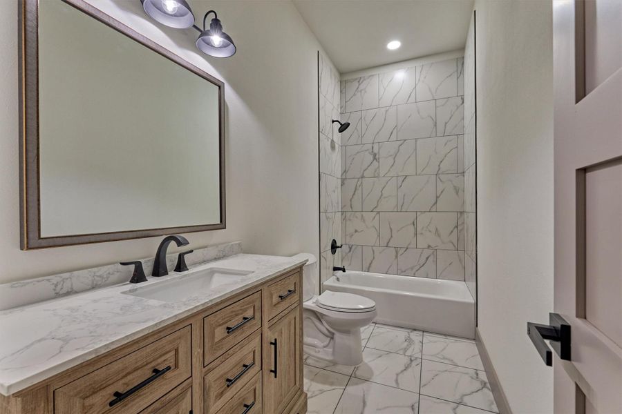 Another full bath with designer vanity and finishes