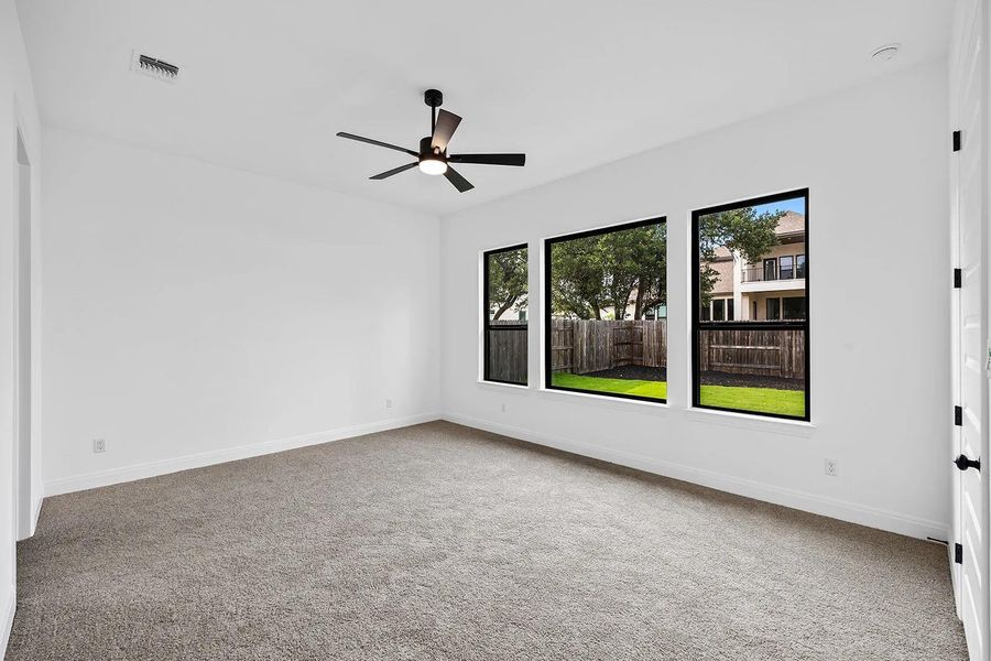 Spacious, unfurnished interior of a new home in Caliterra - 80', Dripping Springs (Image 12).