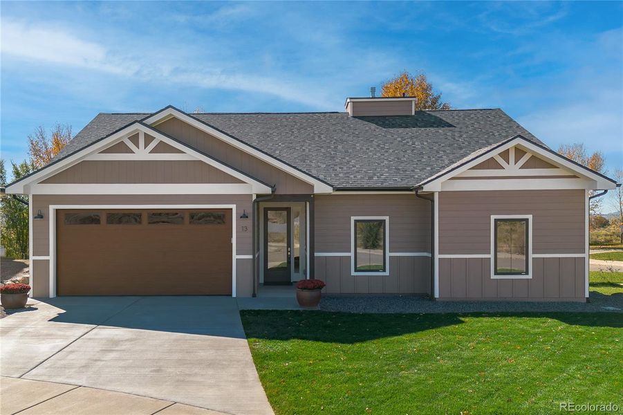 Front exterior of a new home in , Silt, CO, highlighting curb appeal (Image 1).