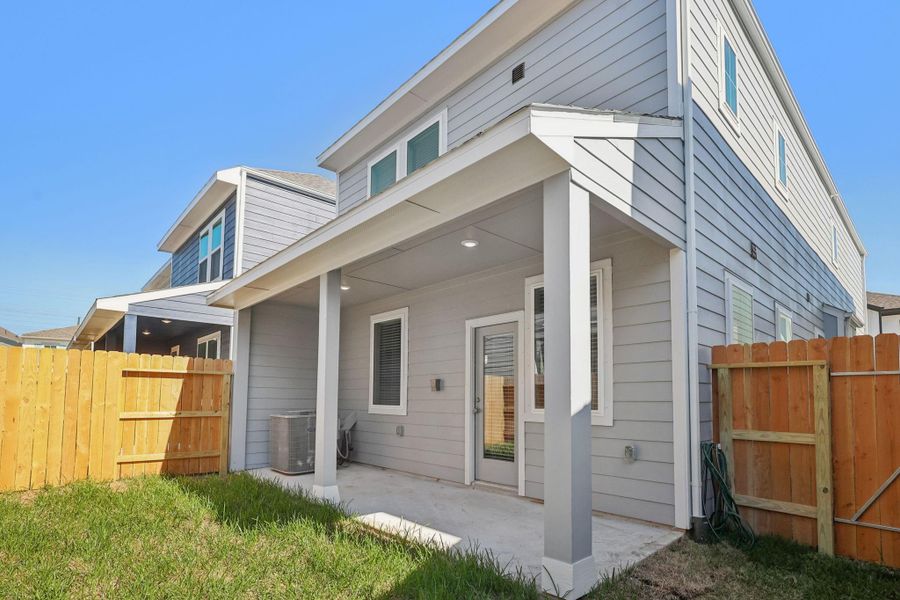 Exterior details and patio area of a home in Kemah Crossing - City Series, Kemah (Image 4). Exterior details and patio area of a home in Kemah Crossing - City Series, Kemah (Image 4).