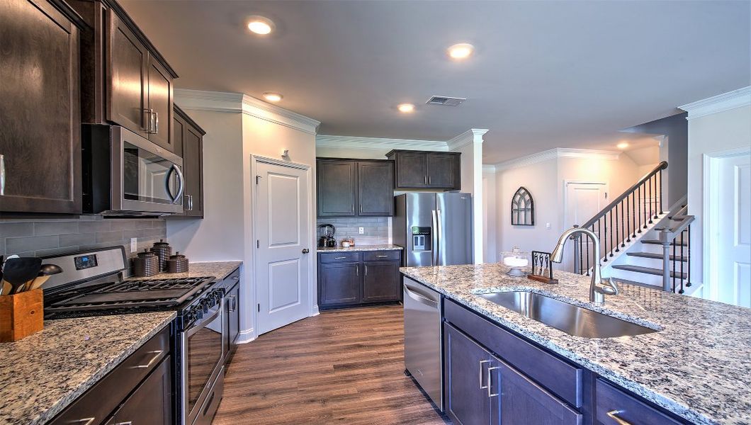 Furnished interior view inside a new home in Reserve at Tap Root Farms, Fletcher (Image 10). Furnished interior view inside a new home in Reserve at Tap Root Farms, Fletcher (Image 10).