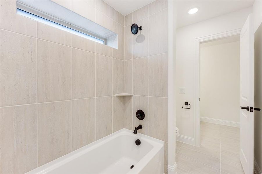 Furnished interior view inside a new home in Windsong Ranch Classic 61, Prosper (Image 14).