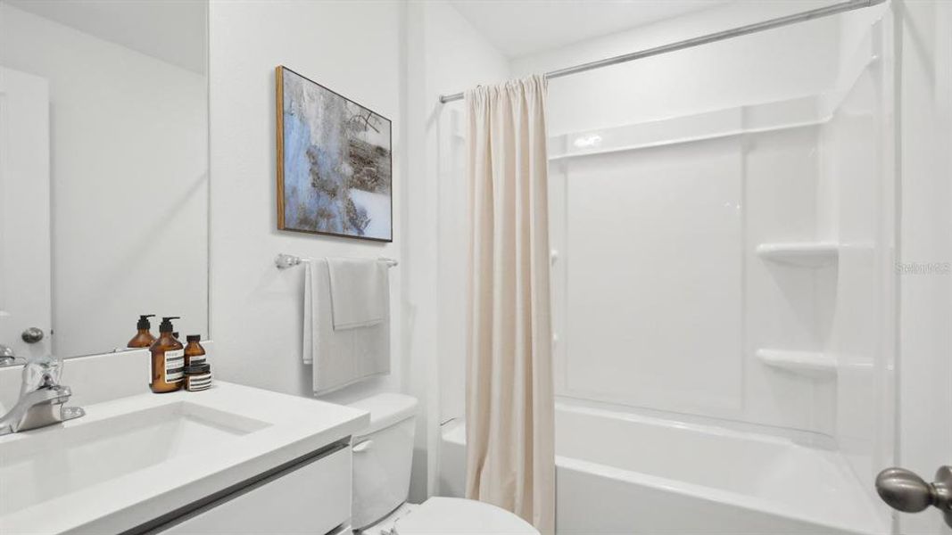 Furnished interior view inside a new home in Oakfield Lakes, Parrish (Image 7).