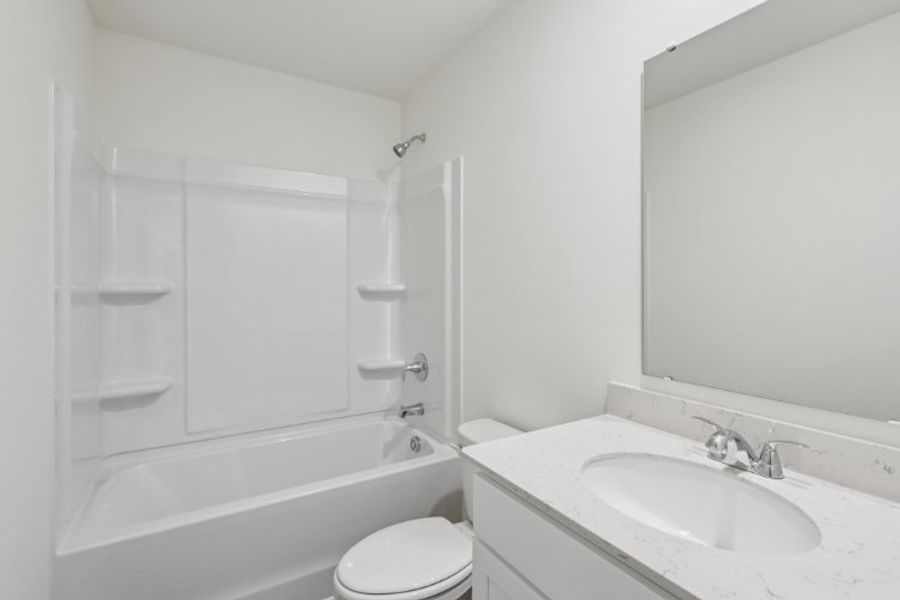 A bathroom with a sink and a bathtub.