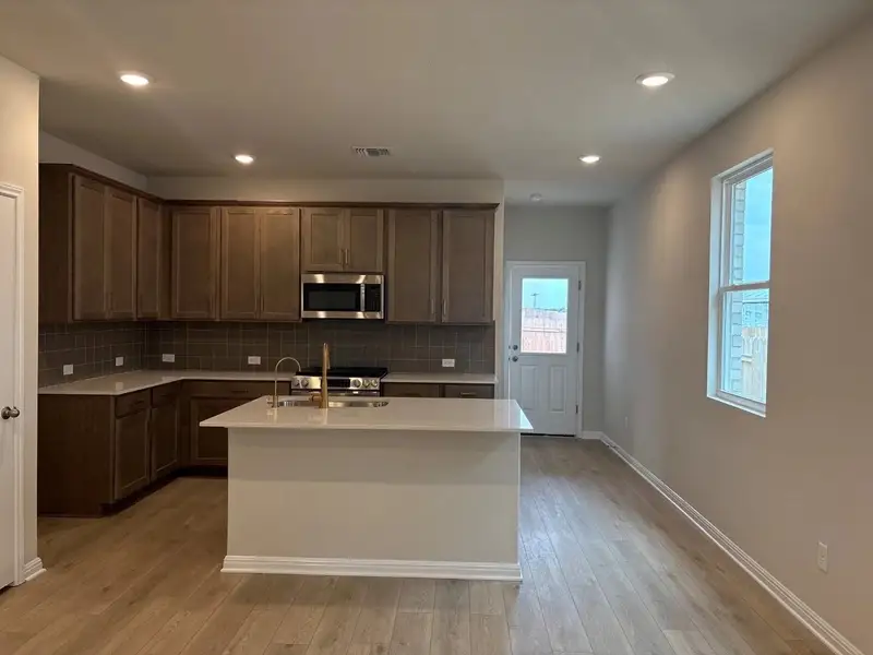 Furnished interior view inside a new home in La Cima, San Marcos (Image 4).