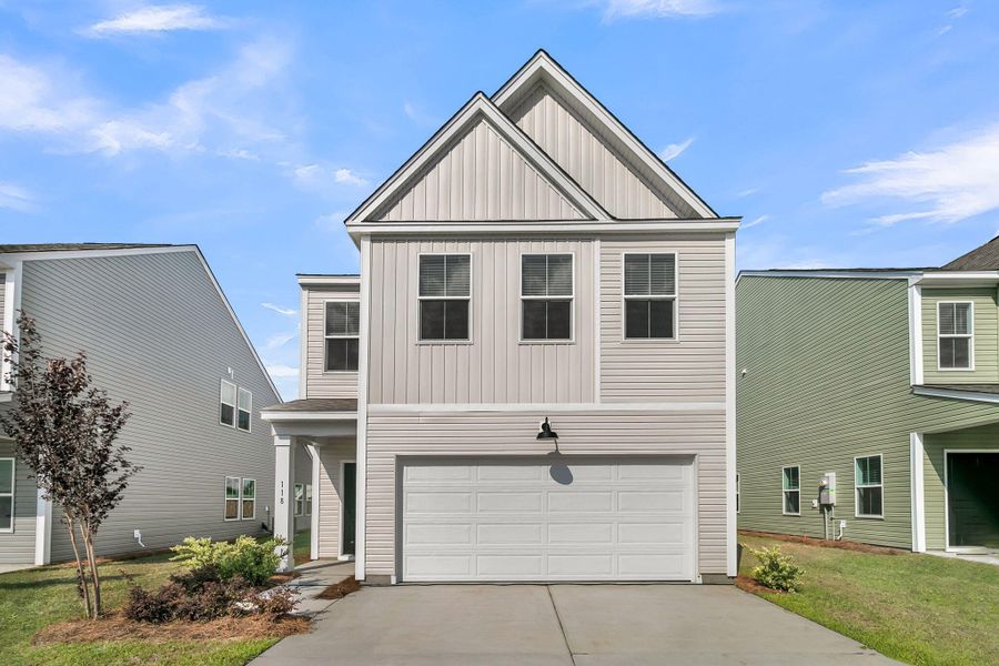 Front exterior of a new home in Wildcat Chase, Summerville, SC, highlighting curb appeal (Image 1). Front exterior of a new home in Wildcat Chase, Summerville, SC, highlighting curb appeal (Image 1).