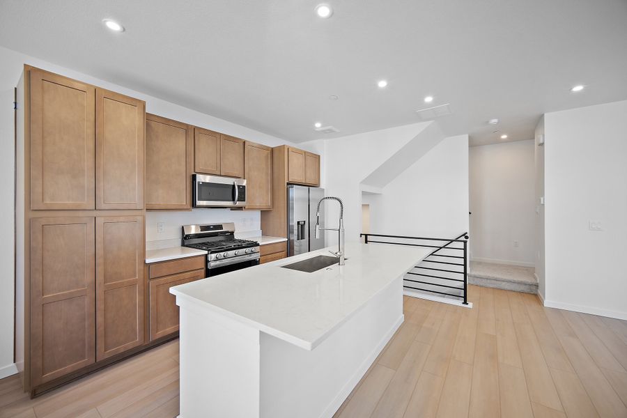 Furnished interior view inside a new home in Lyric at RidgeGate Townhomes, Lone Tree (Image 6).