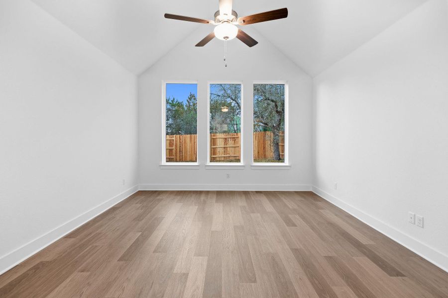 Primary Bedroom with elevated ceiling