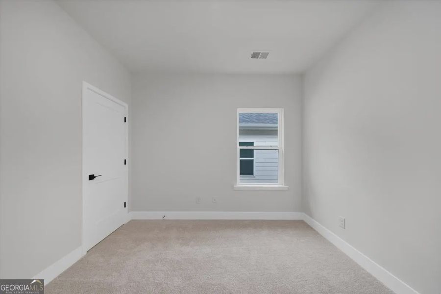 Spacious, unfurnished interior of a new home in Canterbury Villas, Carrollton (Image 28).
