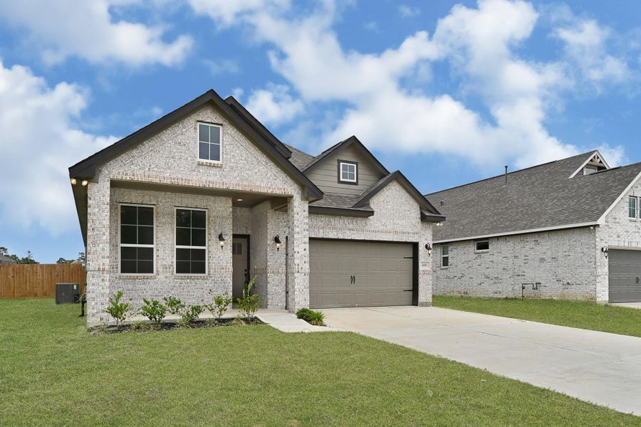 Front exterior of a new home in , Anahuac, TX, highlighting curb appeal (Image 1).