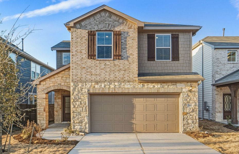 Front exterior of a new home in Horizon Lake, Leander, TX, highlighting curb appeal (Image 23).