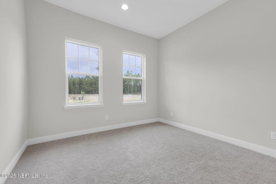 Spacious, unfurnished interior of a new home in Hidden Creek at SilverLeaf 70' Series, St. Augustine (Image 13).