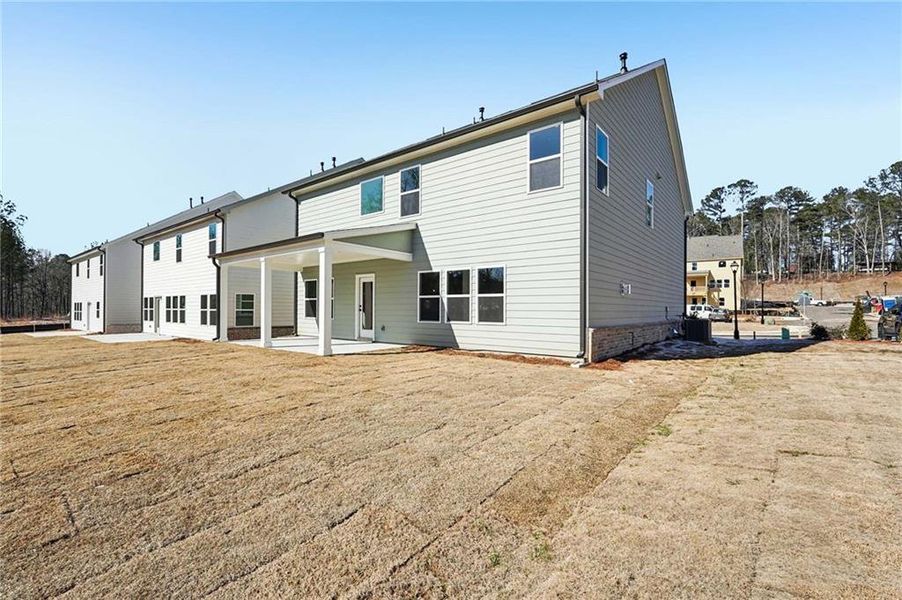 Exterior details and patio area of a home in Arbors at Richland Creek, Buford (Image 25). Exterior details and patio area of a home in Arbors at Richland Creek, Buford (Image 25).