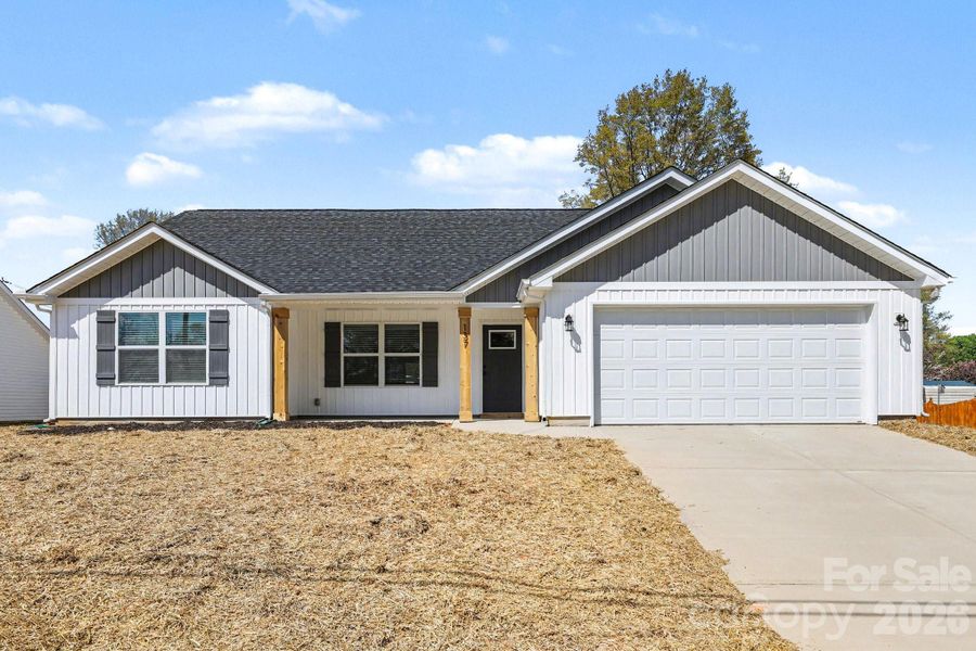 Front exterior of a new home in , Kannapolis, NC, highlighting curb appeal (Image 1). Front exterior of a new home in , Kannapolis, NC, highlighting curb appeal (Image 1).