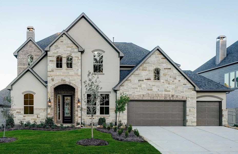 Representative exterior photo of a completed home built from the 3799 by Ravenna Homes in Cross Creek West, Fulshear, TX (Image 28). Representative exterior photo of a completed home built from the 3799 by Ravenna Homes in Cross Creek West, Fulshear, TX (Image 28).