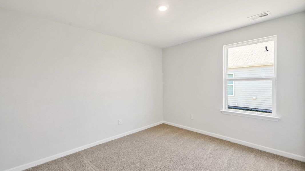 Spacious, unfurnished interior of a new home in Lockwood Landing, Supply (Image 13).