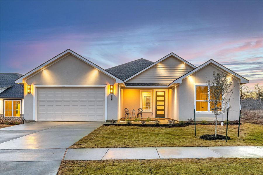 Front exterior of a new home in , Gonzales, TX, highlighting curb appeal (Image 1). Front exterior of a new home in , Gonzales, TX, highlighting curb appeal (Image 1).