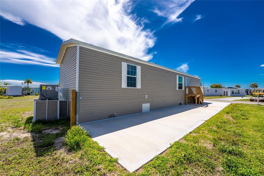 Exterior details and patio area of a home in , Port Charlotte (Image 17).