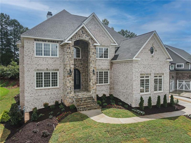Front exterior of a new home in , Suwanee, GA, highlighting curb appeal (Image 23).