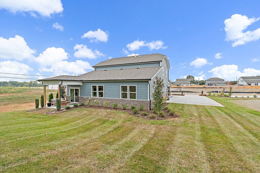 A house with a large yard. A house with a large yard.