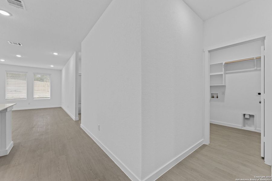 Spacious, unfurnished interior of a new home in Waterwheel: Coastline Collection, San Antonio (Image 17).